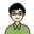 Cartoon illustration of a person with short black hair, black-rimmed glasses, and a green collared shirt.