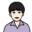 Cartoon portrait of a person with short black hair and a lavender shirt, facing forward.