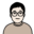 Cartoon portrait of a person with black hair and round glasses, shown from the shoulders up (avatar style).